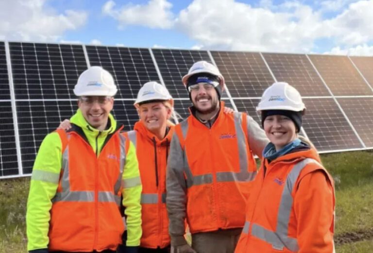 Solar farm workers on hire from Tradeconnex Labour Hire posing for a team photo on site