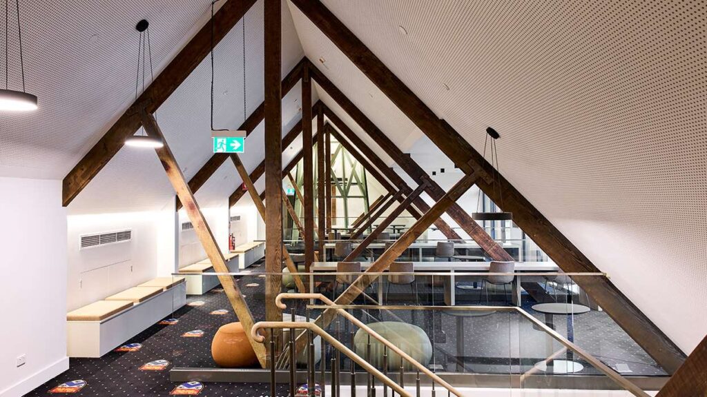 Wesley College refurbished roof space with timber trusses - TradeConnex